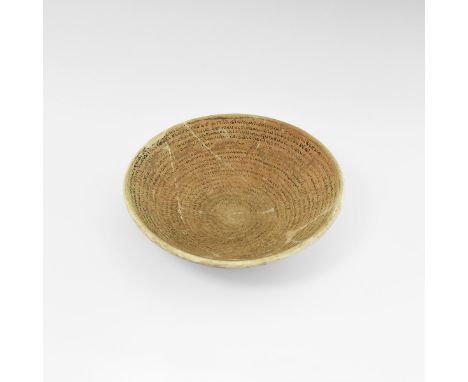 4th-8th century AD. A ceramic round-based bowl, inscribed with exceptionally long and fine inscription in Aramaic, the inscri