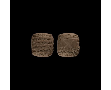19th-16th century BC. A pillow-shaped ceramic tablet with incised cuneiform text to both broad faces, the reverse with a larg