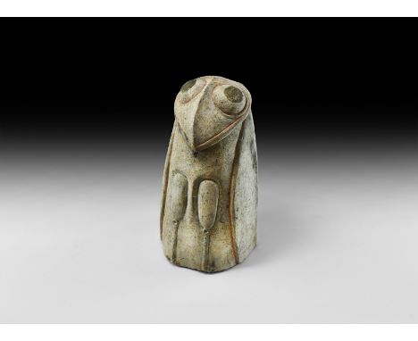 Han Dynasty, 206 BC-220 AD. An unusual ceramic vessel in the form of a sitting owl, body details painted in vivid blue and re