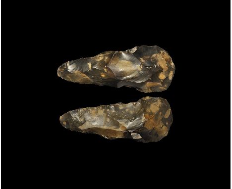 30000-15000 years BP. A large and well-formed bifacial axe with pointed butt and convex cutting edge, of heavy cross-section;