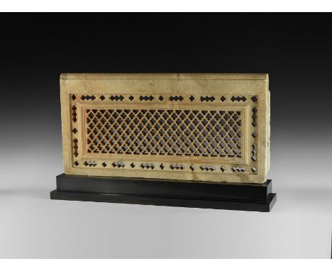 16th-17th century AD. A rectangular marble architectural panel with central lattice panel and piercedwork frame; mounted on a