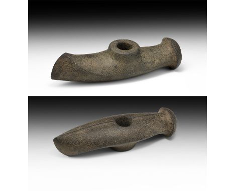 Late 3rd-early 2nd millennium BC. A large and finely formed boat-shaped axe in a dark diorite with asymmetric convex cutting 