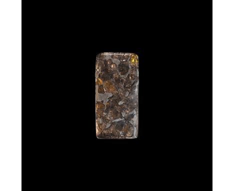 A highly polished triangular section of the Seymchan meteorite with a number of olivine inclusions. Cf. Graham, A.L., Bevan, 