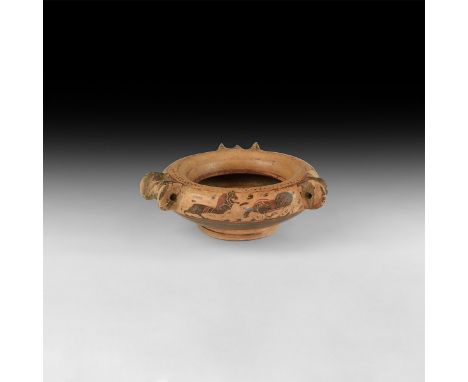 6th century BC. A polychrome ceramic plemochoe (kothon) attributed to the ’Wolfe Painter'; the frieze around the body divided