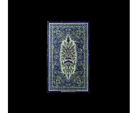 19th century AD. A panel of fifteen glazed ceramic tiles in Iznik-style dark blue field with linear border of tulip flowers s