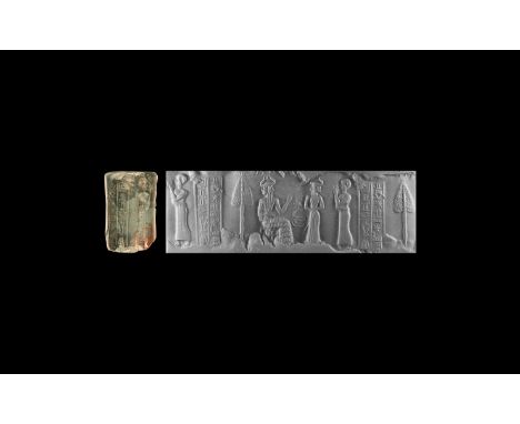 Ur III, King Shu-sin, 1972-1964 BC.&nbsp;A green and purple jasper cylinder seal with two columns of cuneiform text 'priest o