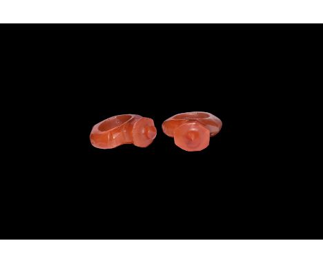 15th-16th century AD. A carnelian finger ring comprising a D-section hoop with knop to the underside, stepped shoulders, octa