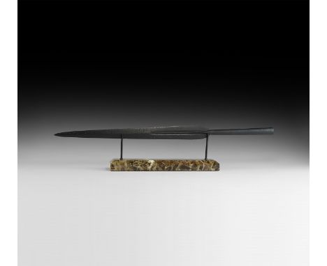 1st century BC-1st century AD. A substantial iron spearhead with narrow leaf-shaped blade, with central rib and blood channel