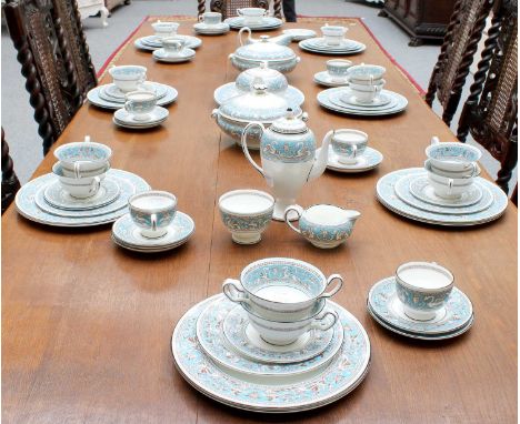 A Wedgwood Florentine Dinner and Tea Service, including tureens, dinner plates, side plates, sauce boats, teapot, coffee pot,