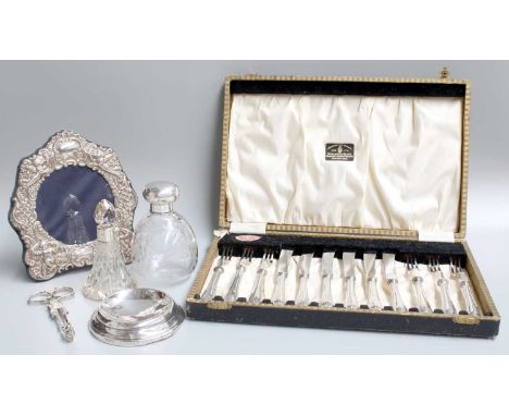 A Collection of Assorted Silver and Silver-Mounted Items, including a pair of George II silver sugar-nips, a cased set of sil