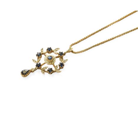 A Sapphire and Diamond Pendant on Chain, the central round cut sapphire within a border of round brilliant cut diamonds, to a