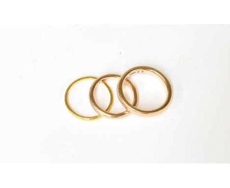 A 22 Carat Gold Band Ring, finger size M; and Two 9 Carat Gold Band Rings, finger sizes J and N1/222 carat gold – 1.9 grams. 