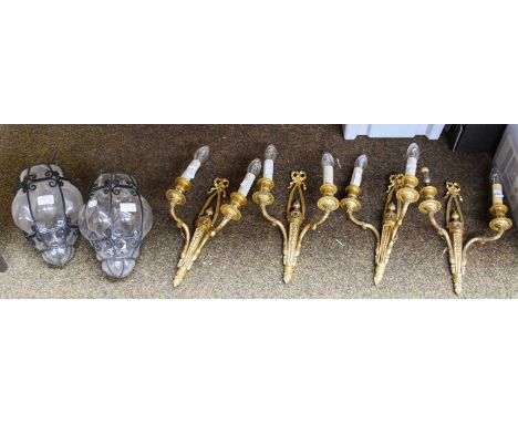 A Set of Four Gilt Metal Twin-Light Wall Sconces, together with two iron and blown glass lanterns (6)Wall lights - 36cm by 25