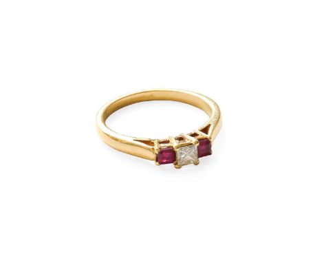 A Ruby and Diamond Three Stone Ring, the princess cut diamond flanked by square cut rubies, in yellow claw settings, to a tap