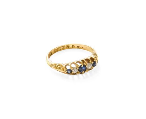 An 18 Carat Gold Sapphire and Diamond Five Stone Ring, three graduated round cut sapphires alternate with old cut diamonds, i