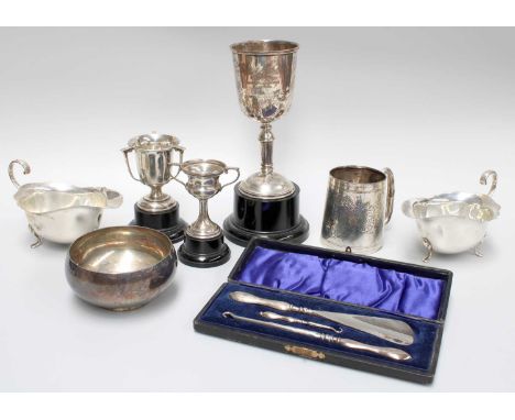 A Collection of Assorted Silver, comprising a christening-mug; a bowl; a pair of sauceboats; a cased shoe-horn and two button