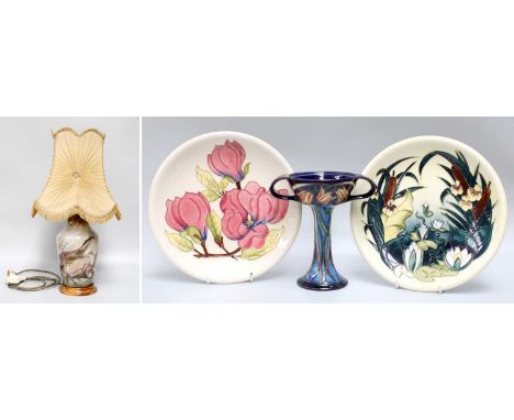 Two Moorcroft Plates, Cobridge lamp and a Moorcroft twin-handled comport (lacking cover) (4) 