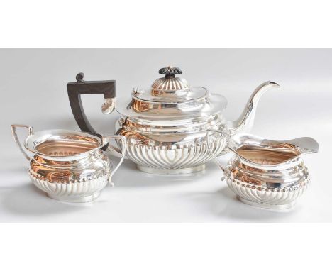 A Three-Piece Elizabeth II Silver Tea-Service, by J. B. Chatterley and Sons Ltd., Birmingham, 1972, each piece oval and with 