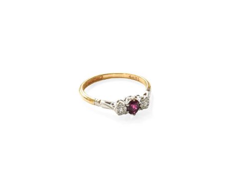 A Ruby and Diamond Three Stone Ring, the oval cut ruby in a white claw setting, flanked by eight-cut diamonds in illusion set