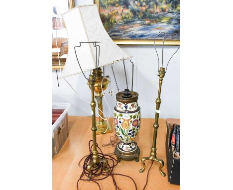 A Pair of Gilt Metal Telescopic Table Lamps, on tripod bases with claw feet, 60cm h to fitting; together with a brass Corinth