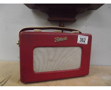 A vintage Roberts model R100 transistor radio.