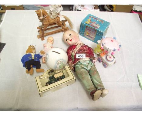 A Japanese doll and other toys