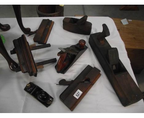 A quantity of vintage wood working planes.