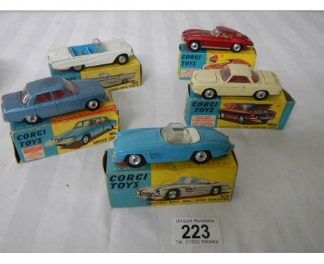 5 boxed Corgi toys Nos 215s, 239, 252, 303, 310, Ford, Rover, Mercedes etc., in original boxes, some with missing end flaps. 