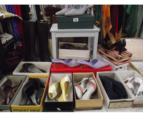 A quantity of vintage ladies shoes.