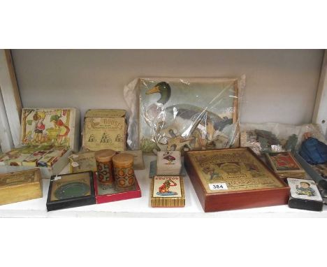 A shelf of vintage puzzles, games, jigsaws, cards etc. (completeness of jigsaws unknown)