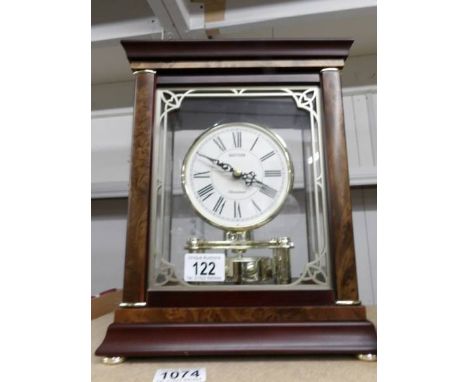 A caned 'Rythm' Westminster bracket/mantle clock.