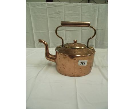 A vintage copper kettle