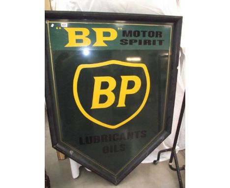 A painted metal BP motor spirit sign.