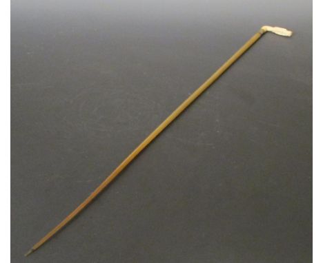 A late 19th/early 20th century horn and ivory walking stick, a loose pearl within the mouth of the dragon's head handle, a fl