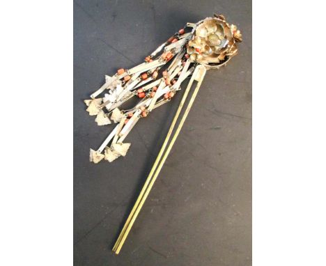 A coral bead and silver plated hair pin, the flower topped double pin hung with baton and bead streamers, 20cm (8 in) long  