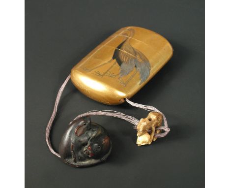 A wooden rat netsuke signed Ikkan (1817-83), an ivory ojime and a lacquer three case inro signed Yoyusai (1772-1845), the two