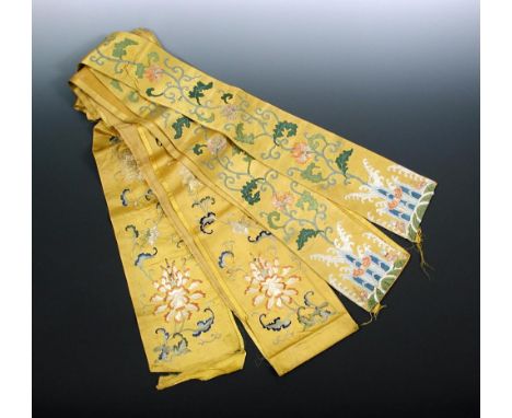 A pair of imperial yellow ground silk tapered bands, cai shui, possibly first half of the 18th century, one of double length 