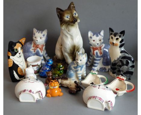 Sixteen ceramic cat models to include three blue-and-white Rye Pottery examples, one by Beswick and a Czech example (probably