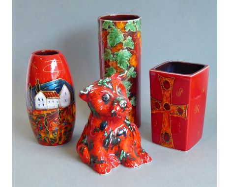 Four Anita Harris Pottery pieces signed in gold lettering and with printed marks to their undersides: three vases (cylindrica