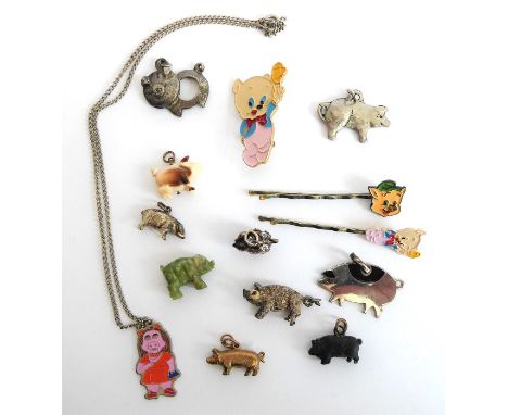 A selection of pendants etc. relating to pigs to include charms, pendants etc, including a 9-carat gold pig charm