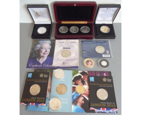 A good selection of Royal Mint boxed and mounted proof and commemorative coins: a boxed Queen's 80th birthday 'Jewelled Golde