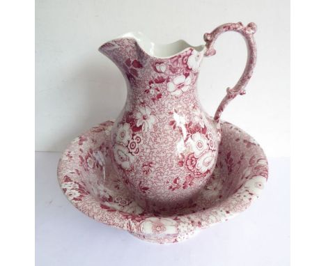 A Spode Archive Collection ceramic jug and bowl in the 'Primula' design - the underside of the bowl stamped: 'First introduce