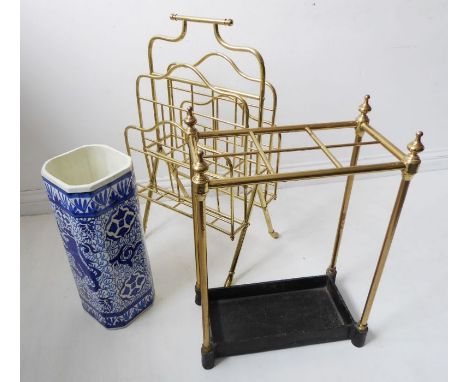 A late 19th century Aesthetic-style four-division waterfall-type Canterbury/magazine rack, a six-division brass stick-stand h