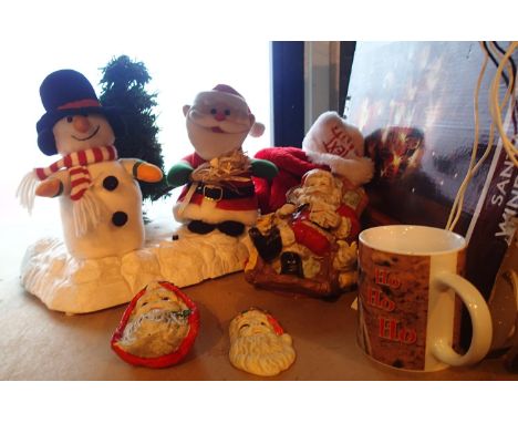 Shelf of mixed Christmas related items to include musical decorations. Not available for in-house P&amp;P, contact Paul O'Hea