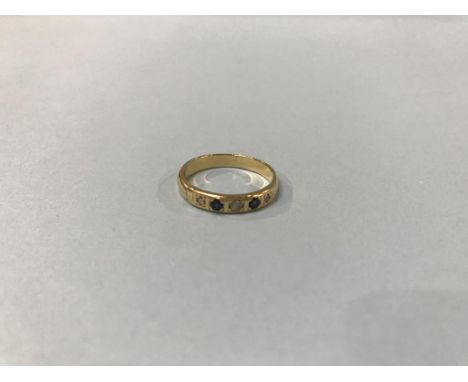 A gold coloured ring, 3.5g