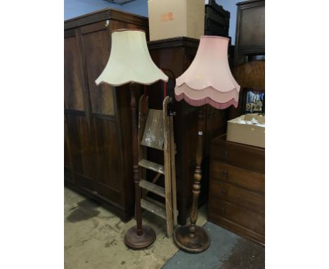 A standard lamp and a pair of step ladders