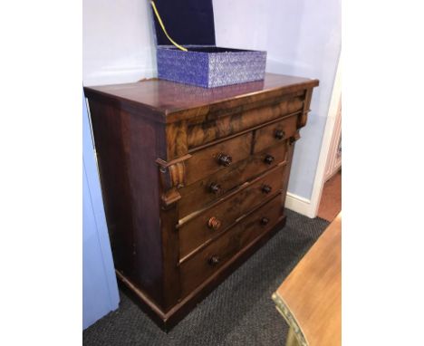 A walnut scotch chest of drawers