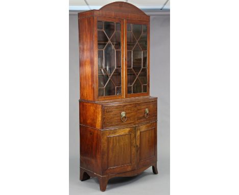 A REGENCY INLAID MAHOGANY SECRETAIRE BOOKCASE, with arched pediment above three adjustable shelves enclosed by pair astragal 