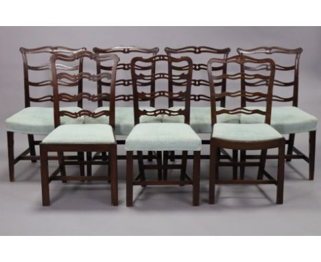 A harlequin set of ten 18th century-style mahogany dining chairs (including a pair of elbow chairs), with pierced ladder back