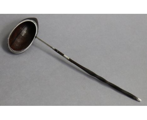 A rare 18th century punch ladle with coconut-shell oval bowl, the un-marked silver mount inscribed “Saml. Jeffries”, with lon